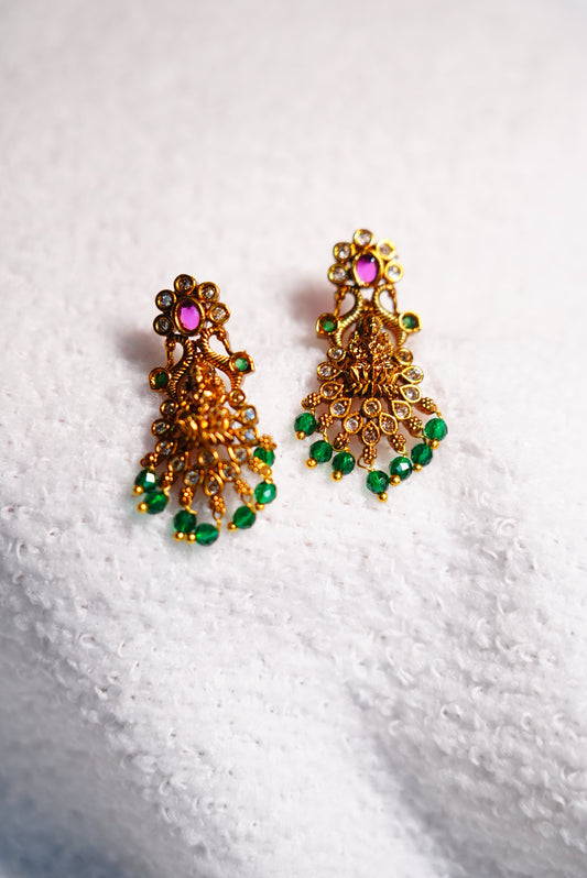 Designer Laxmi-inspired earrings with pearl bead detailing  Perfect accessory for sarees, lehengas, and festive attire