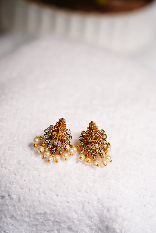 Elegant Laxmi stud design with CZ stones & White pearls for classic sophistication for womens