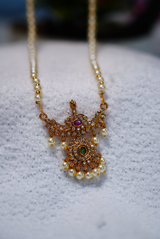 Adorned with premium quality pearls & gold plating