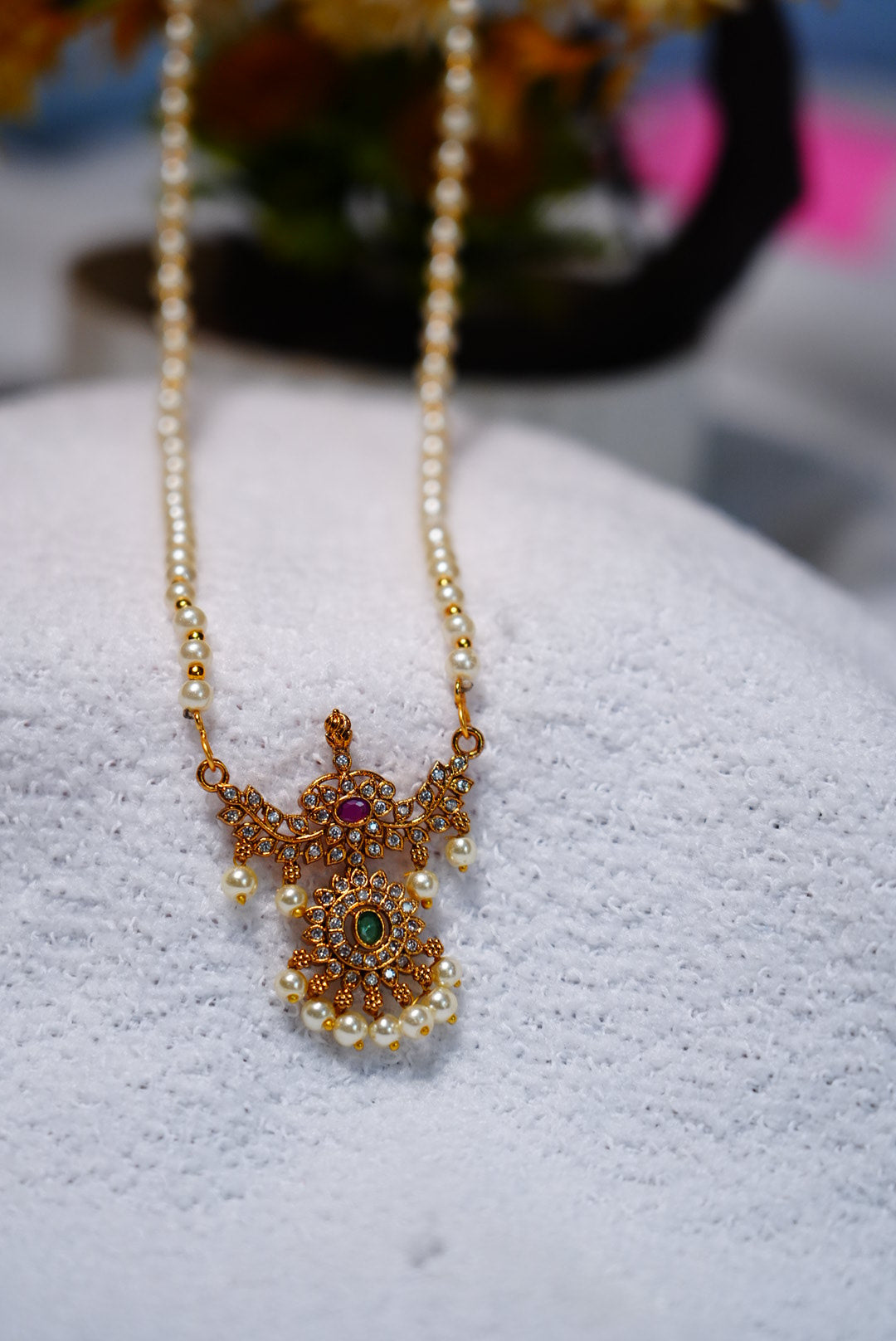 Adorned with premium quality pearls & gold plating